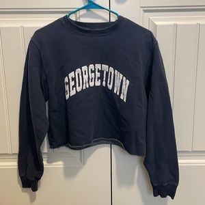 Navy blue, long sleeve, crop top from John Galt. In the size Medium.